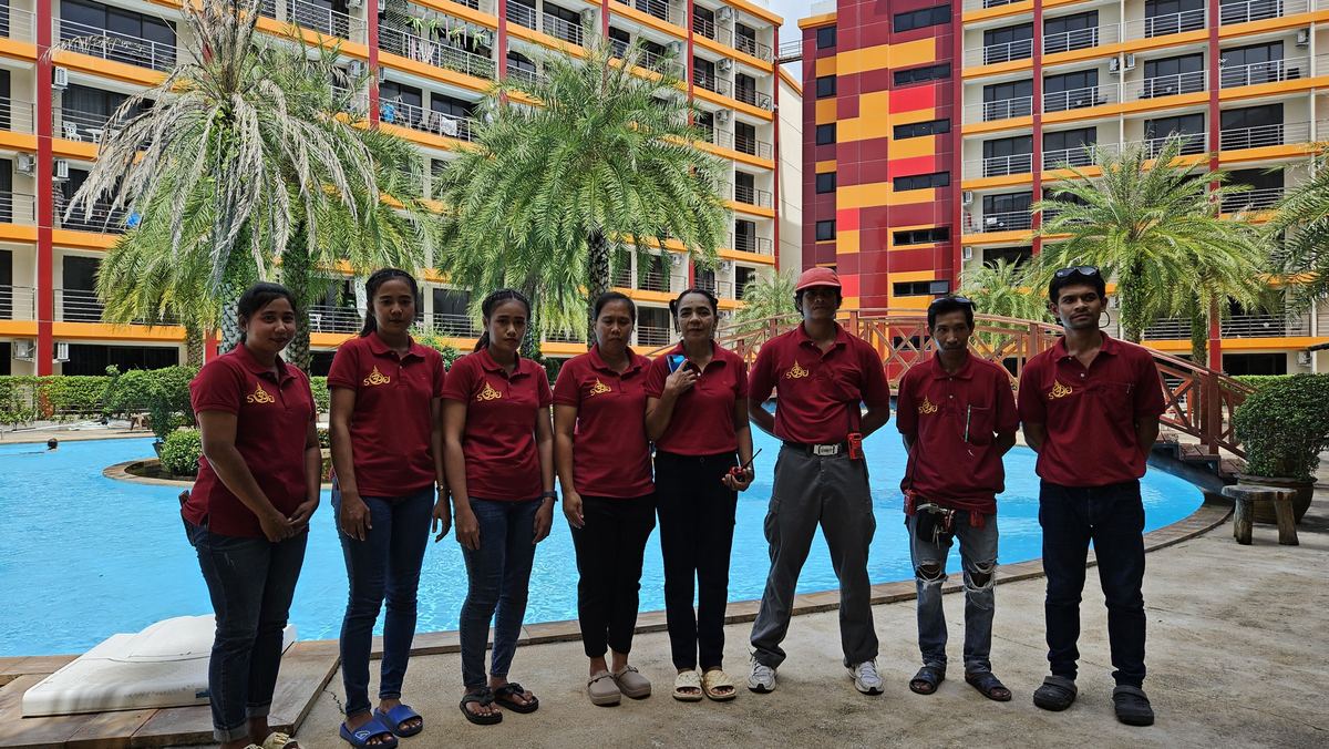 Maids and technicians of 125 Rich Service by the pool